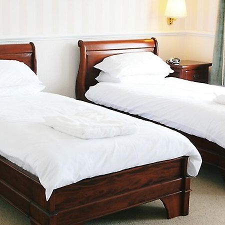 Cliff Head Hotel Карлион Бей Стая снимка